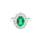 Oval emerald and diamond fancy cluster style ring