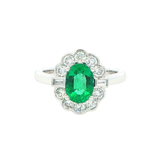 Oval emerald and diamond fancy cluster style ring