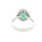 Oval emerald and diamond fancy cluster style ring