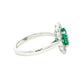 Oval emerald and diamond fancy cluster style ring