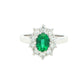 Emerald and round brilliant cut diamond cluster style ring