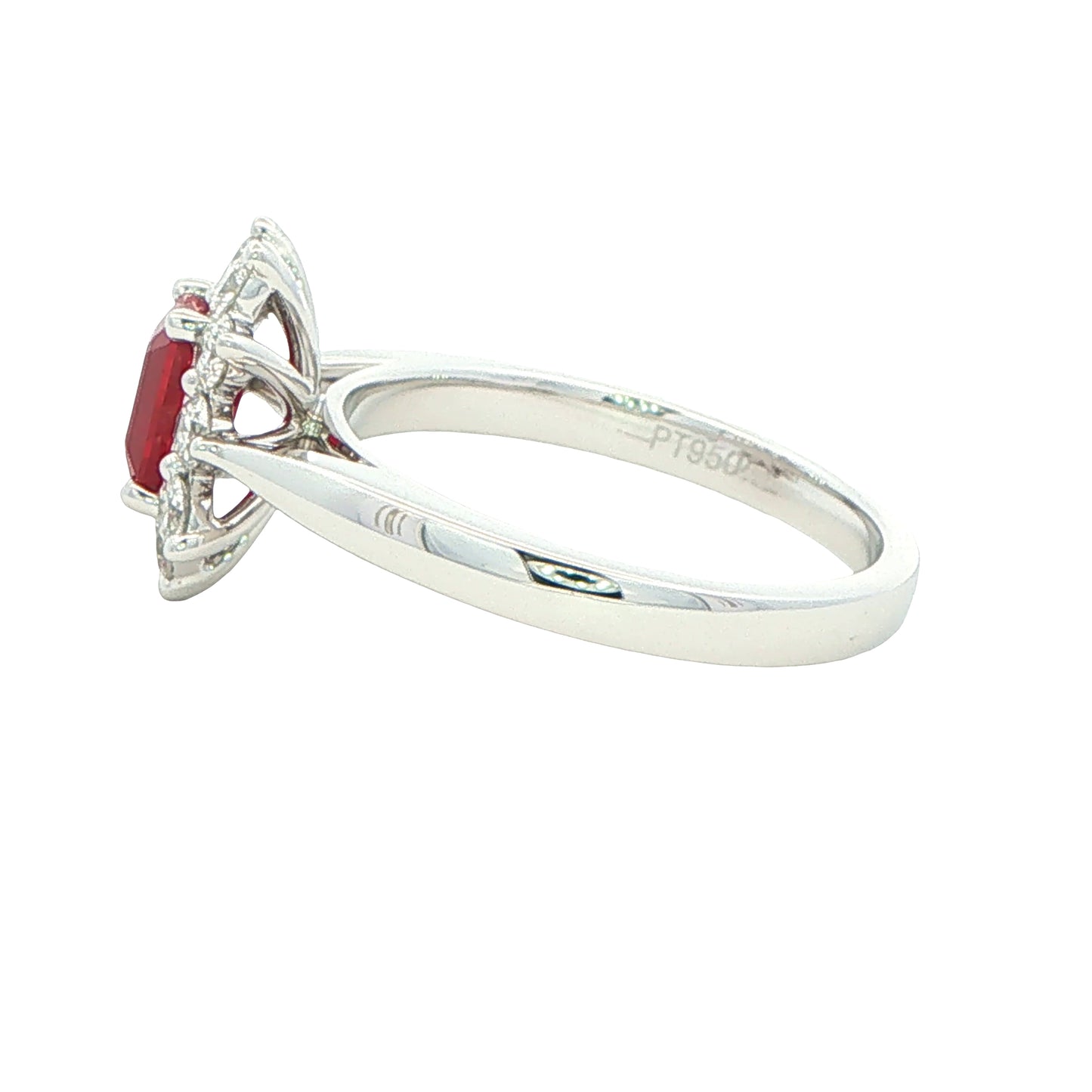 Octagonal shaped ruby and round brilliant cut diamond cluster ring