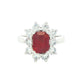 Octagonal shaped ruby and round brilliant cut diamond cluster ring