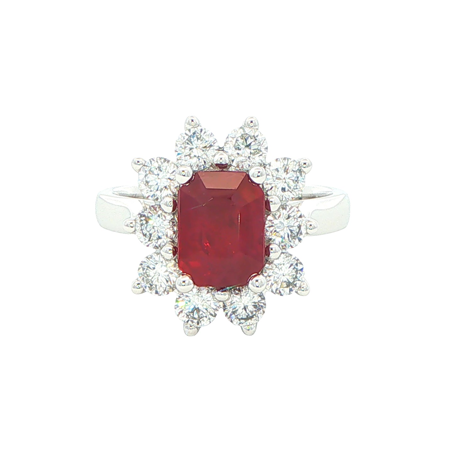 Octagonal shaped ruby and round brilliant cut diamond cluster ring