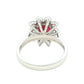 Octagonal shaped ruby and round brilliant cut diamond cluster ring
