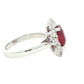 Octagonal shaped ruby and round brilliant cut diamond cluster ring