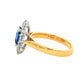 Octagonal Sapphire and round brilliant cut diamond cluster ring