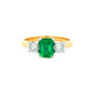 Octagonal Emerald and round brilliant cut diamond 3 stone ring