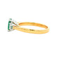 Octagonal Emerald and round brilliant cut diamond 3 stone ring