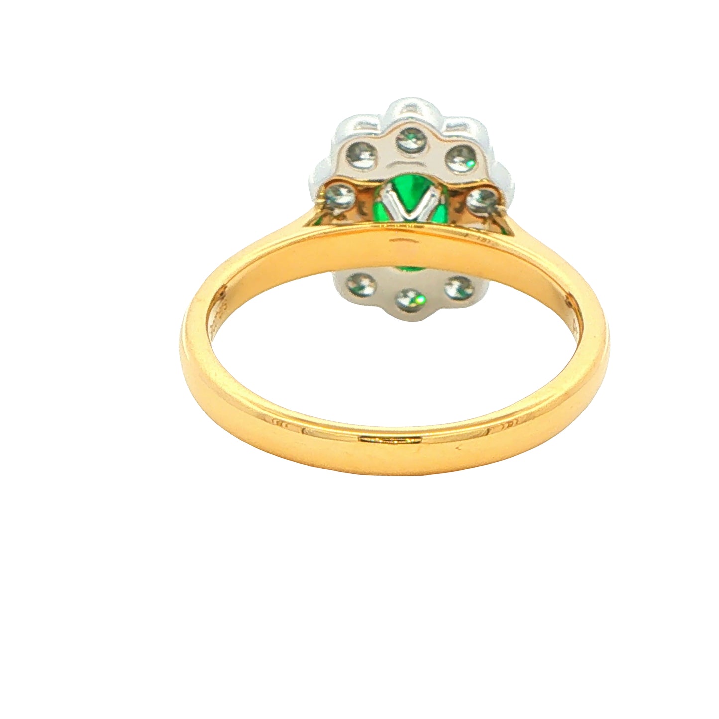 Oval Emerald and Round Brilliant Cut Diamond Cluster Ring