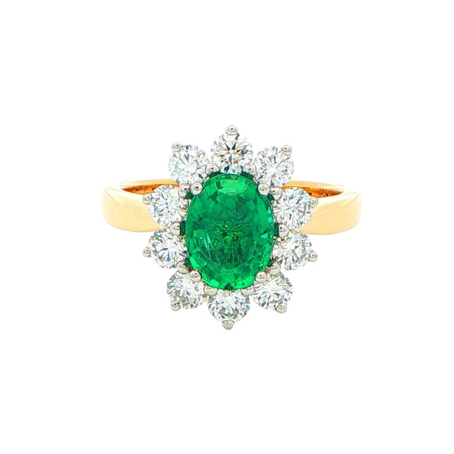 Oval Emerald AND ROUND BRILLIANT CUT DIAMOND CLUSTER STYLE RING