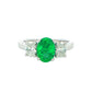 Oval Shaped emerald and oval diamond 3 stone ring Gardiner Brothers