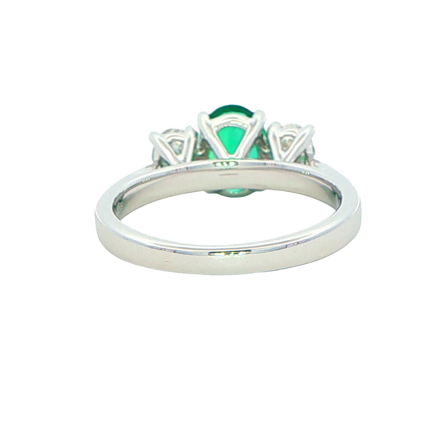 Oval Shaped emerald and oval diamond 3 stone ring Gardiner Brothers