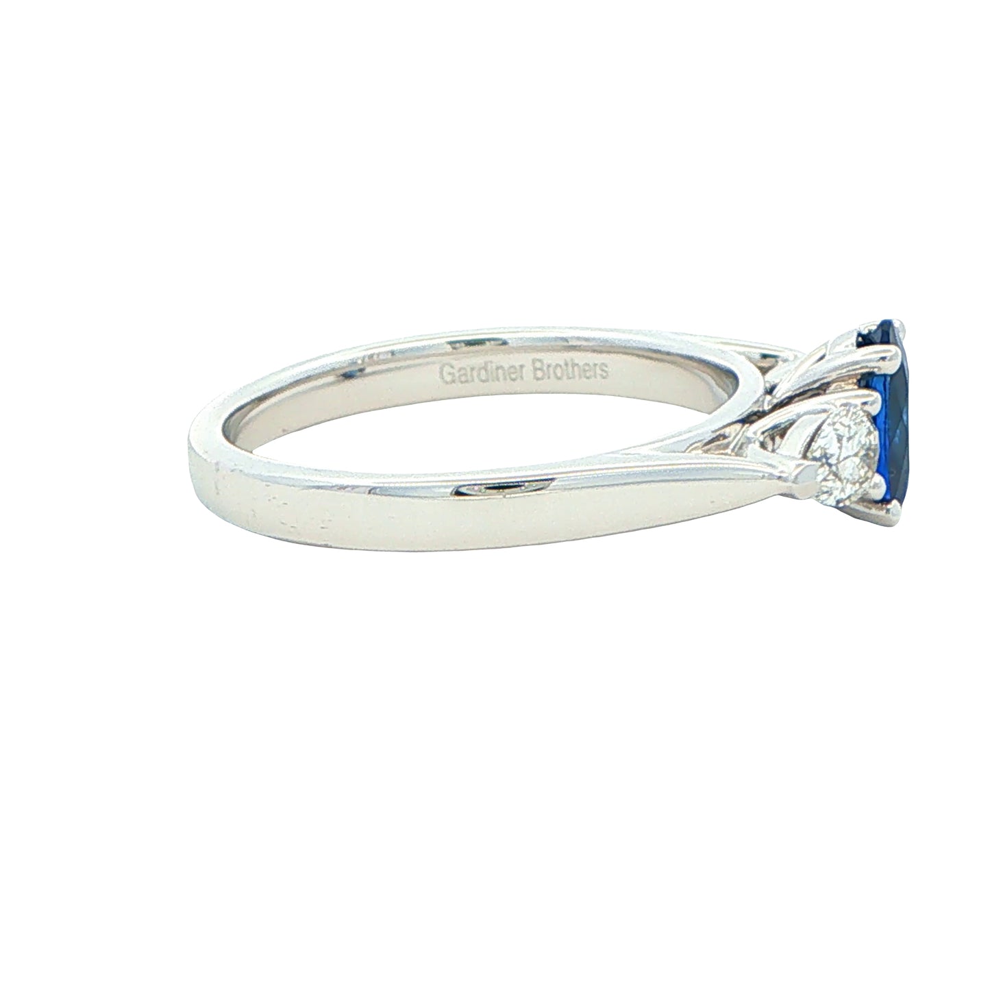 Oval Sapphire and Pear Shaped Diamond 3 Stone Ring