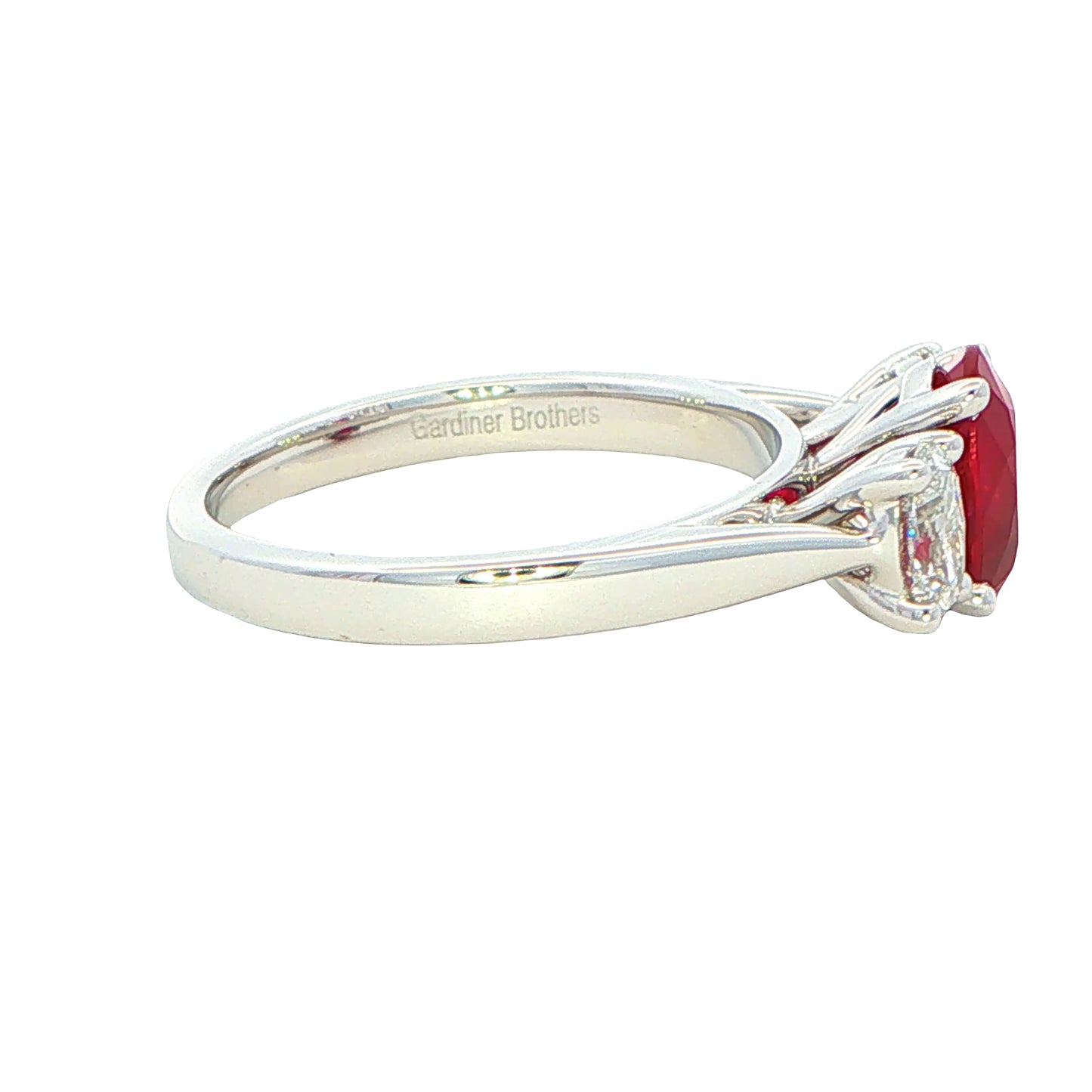 Oval shaped Ruby and Oval Diamond 3 Stone Ring