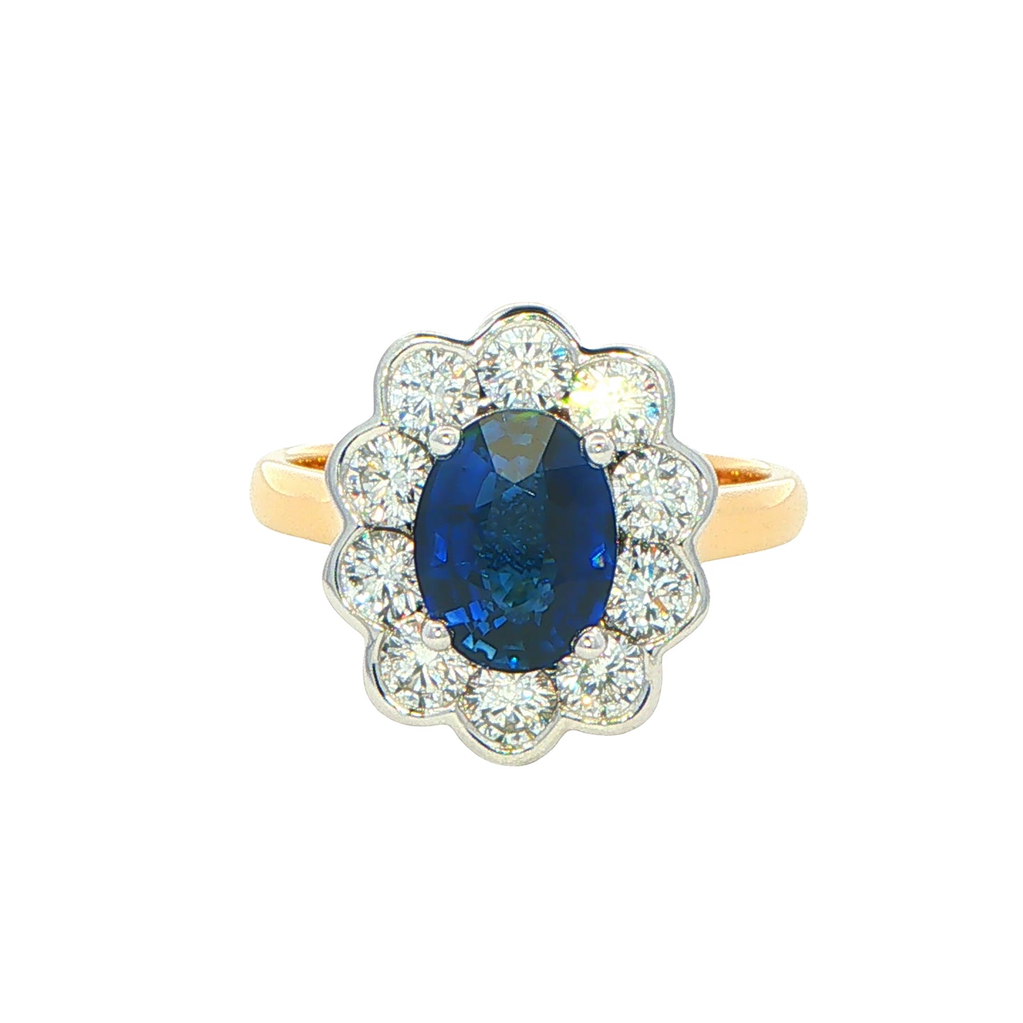 Oval Sapphire and Diamond Modern Cluster Style Ring