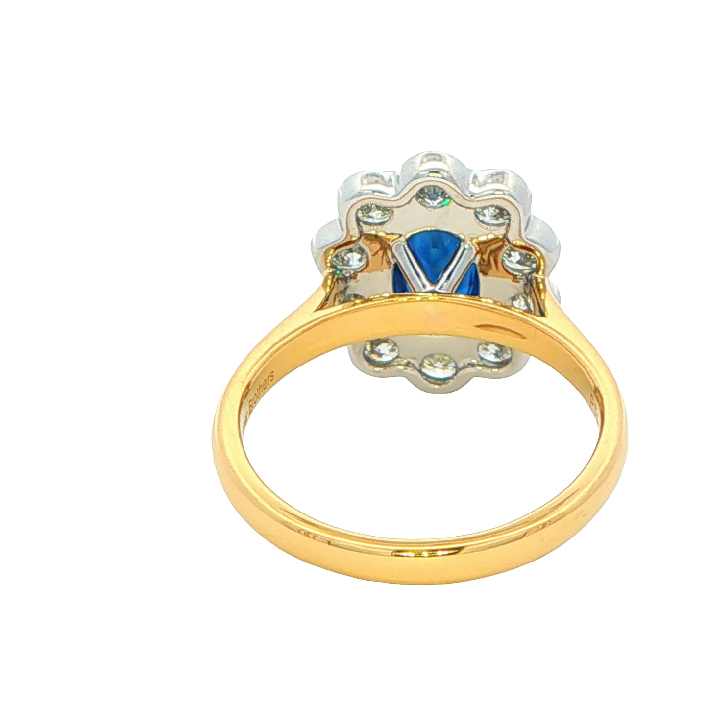 Oval Sapphire and Diamond Modern Cluster Style Ring