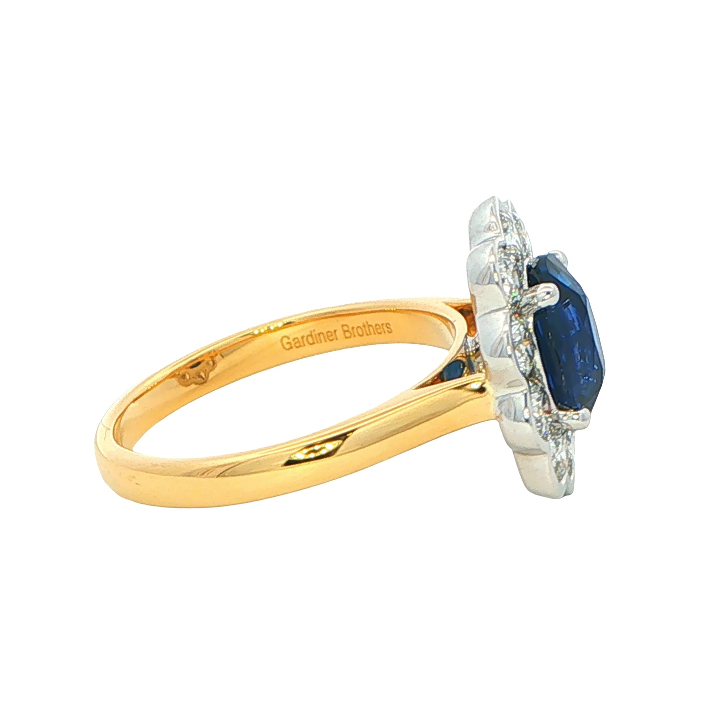 Oval Sapphire and Diamond Modern Cluster Style Ring
