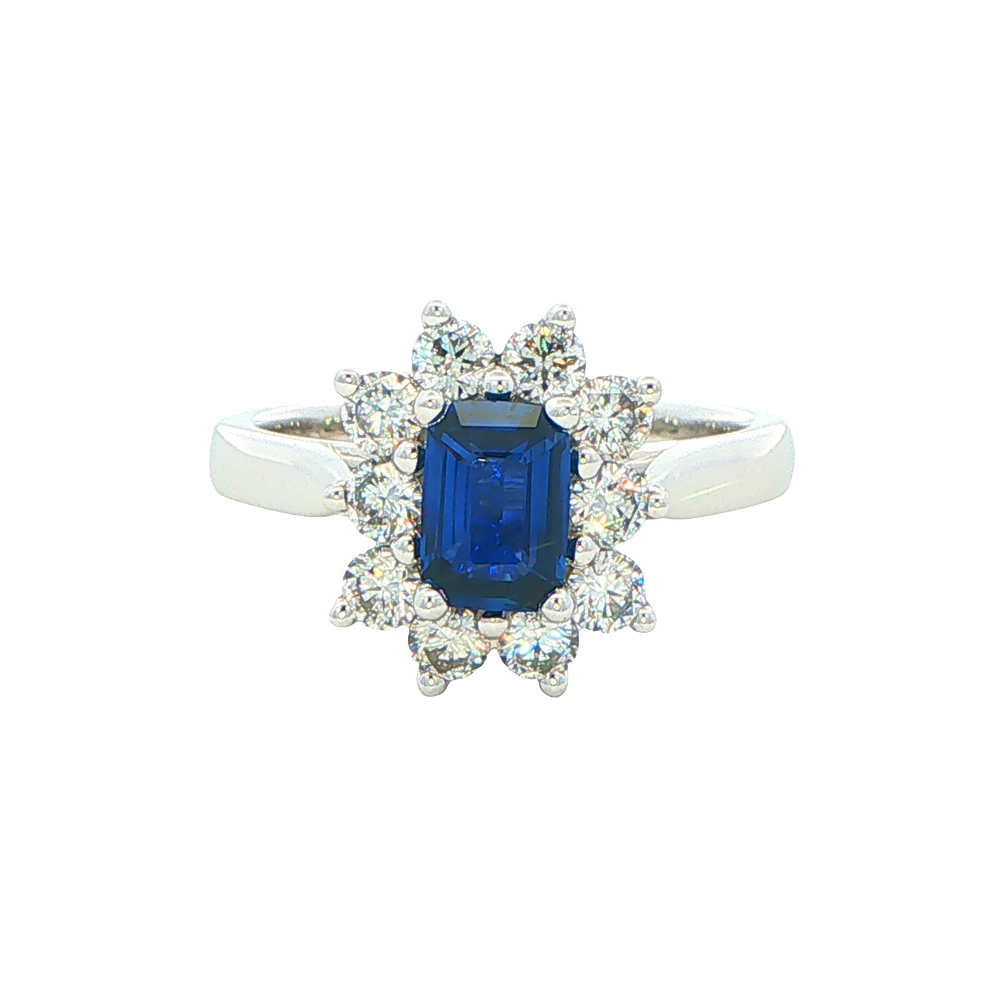 Octagonal Sapphire and round brilliant cut diamond cluster ring