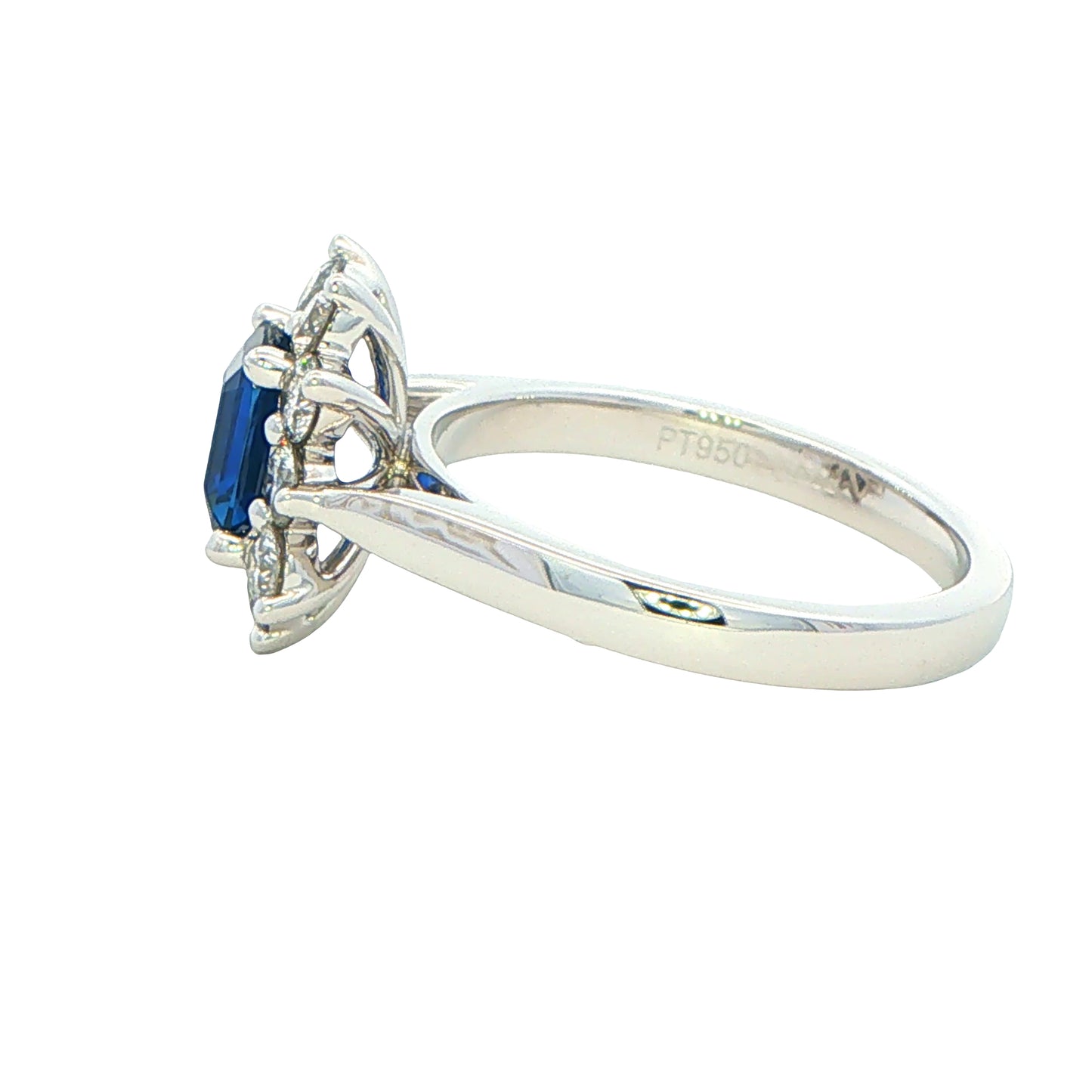 Octagonal Sapphire and round brilliant cut diamond cluster ring