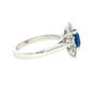 Octagonal Sapphire and round brilliant cut diamond cluster ring