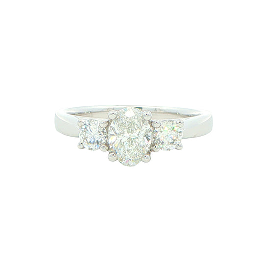 Platinum Oval and round brilliant cut diamond 3 stone ring - 1.10cts