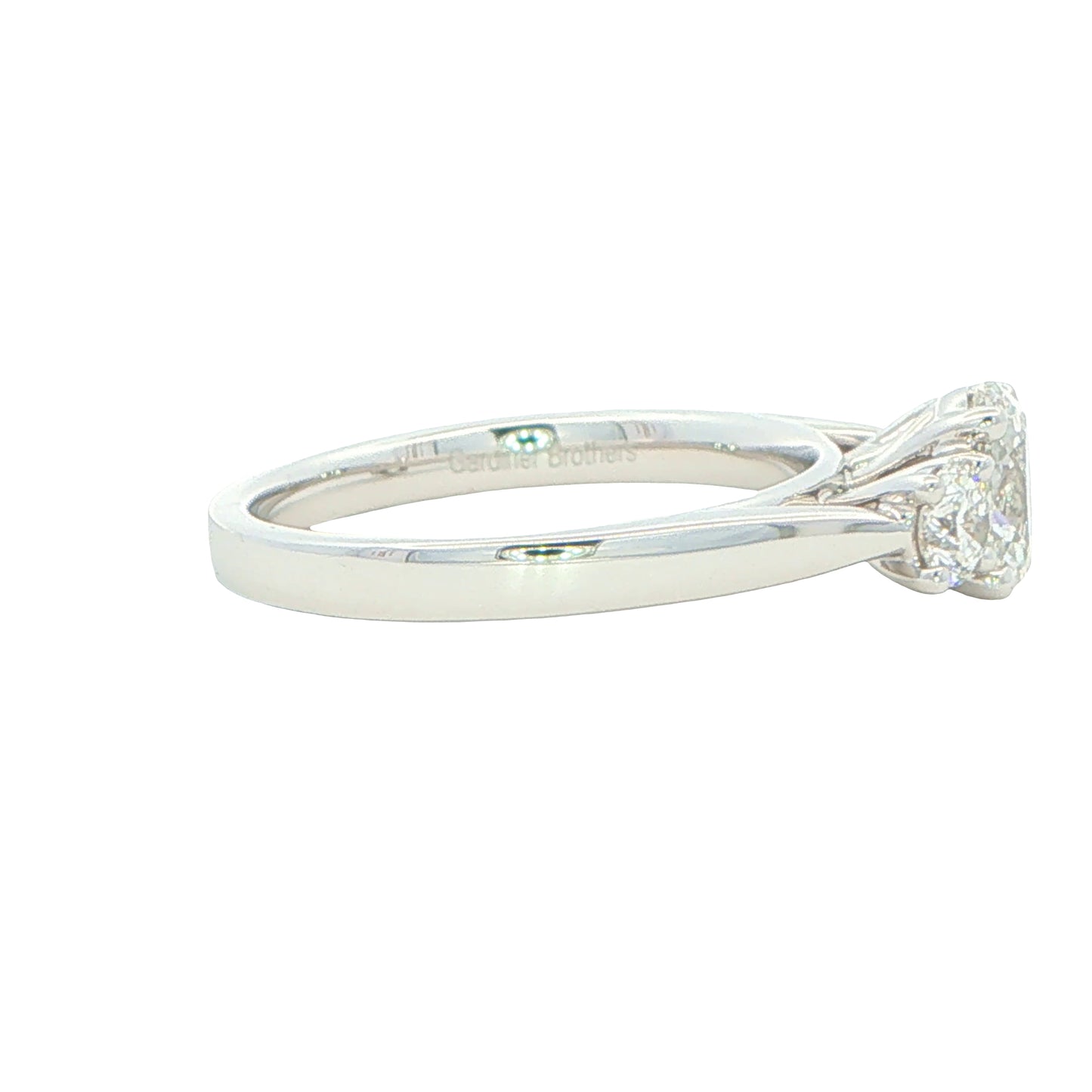 Platinum Oval and round brilliant cut diamond 3 stone ring - 1.10cts