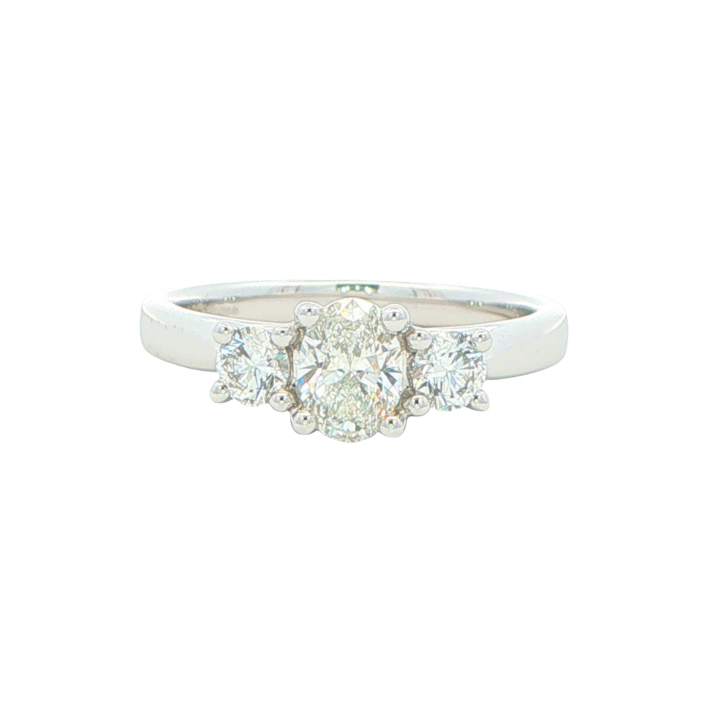 Platinum Oval and round brilliant cut diamond 3 stone ring - 0.82cts