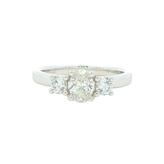 Platinum Oval and round brilliant cut diamond 3 stone ring - 0.82cts