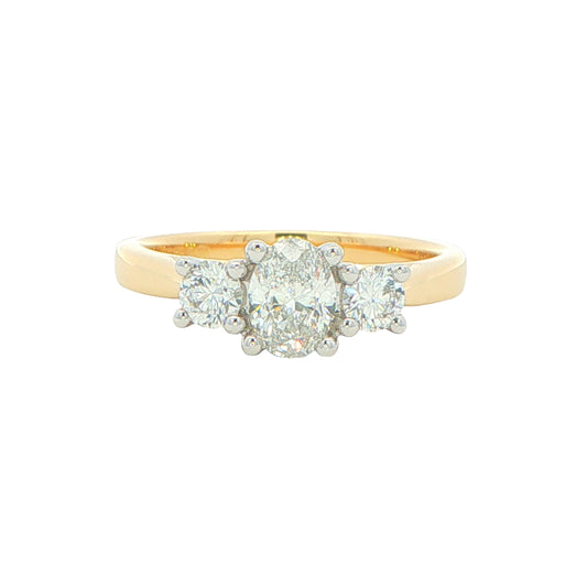 Yellow Gold Oval and round brilliant cut diamond 3 stone ring - 0.83cts