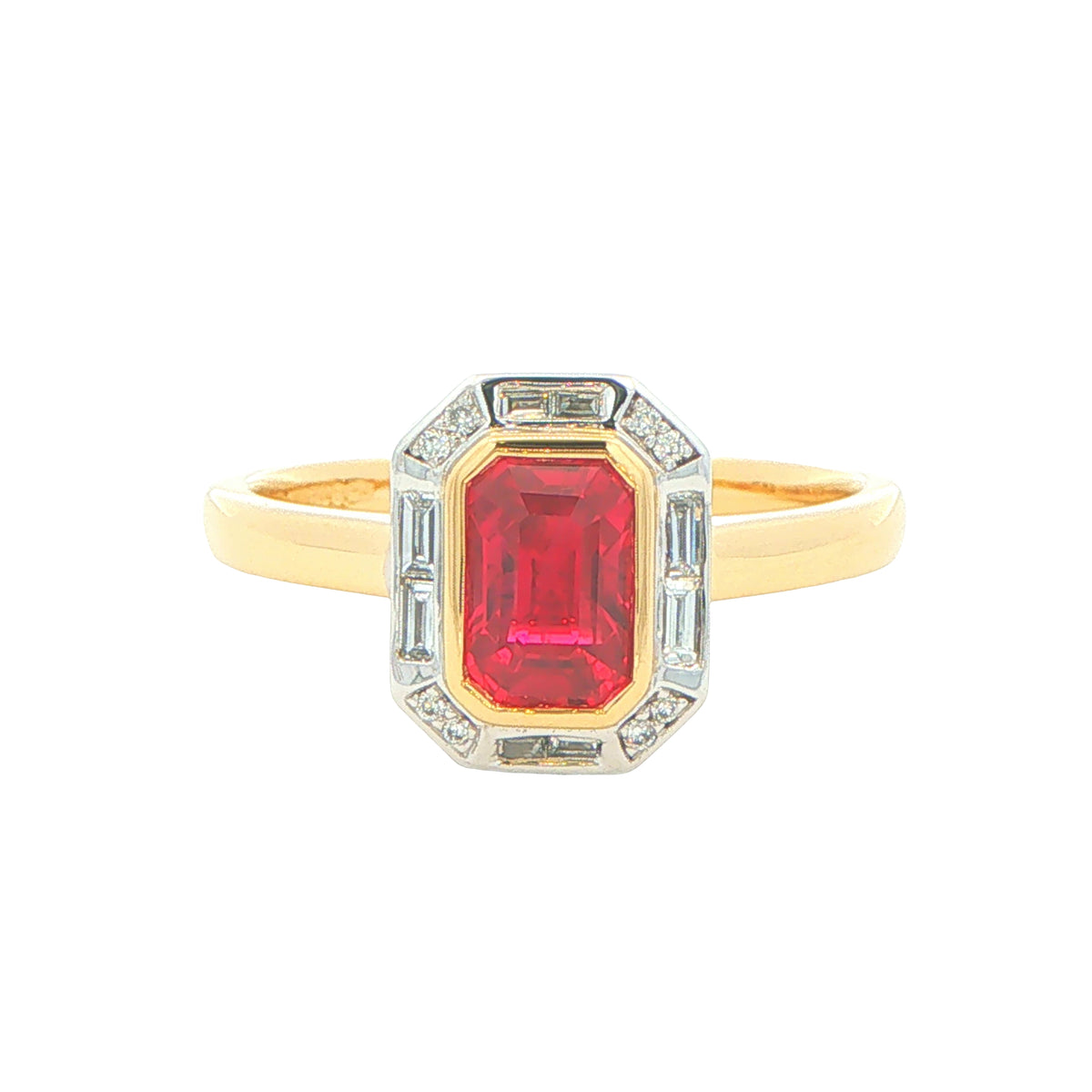 Octagonal Ruby with brilliant and baguette cut diamond cluster ring Gardiner Brothers