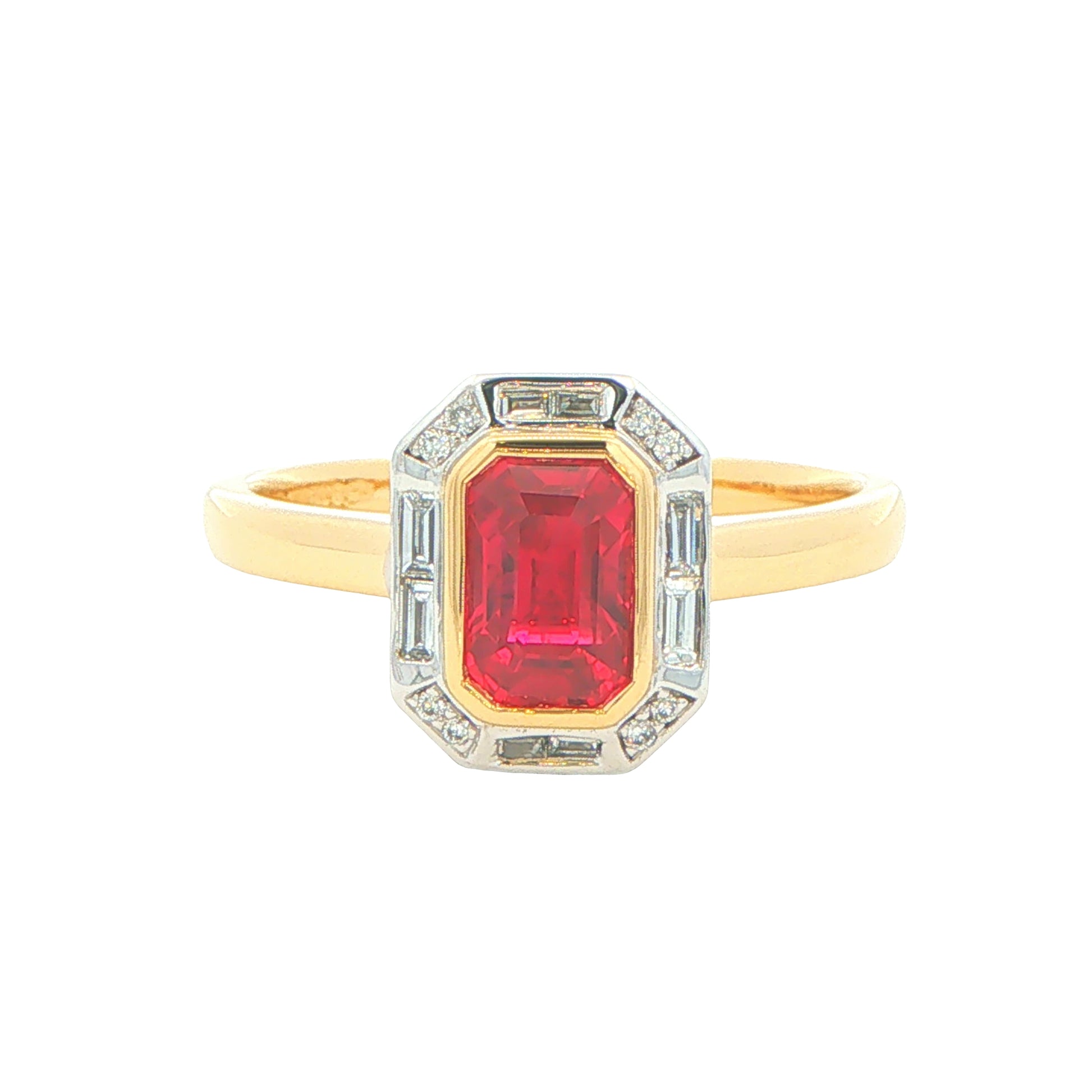 Octagonal Ruby with brilliant and baguette cut diamond cluster ring Gardiner Brothers