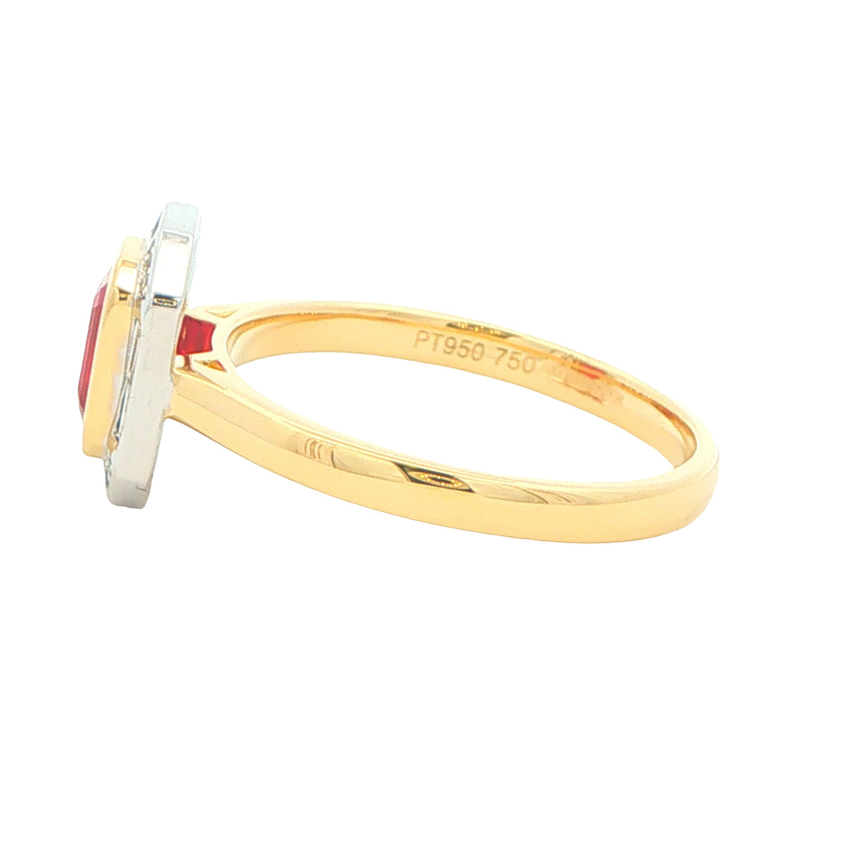 Octagonal Ruby with brilliant and baguette cut diamond cluster ring Gardiner Brothers
