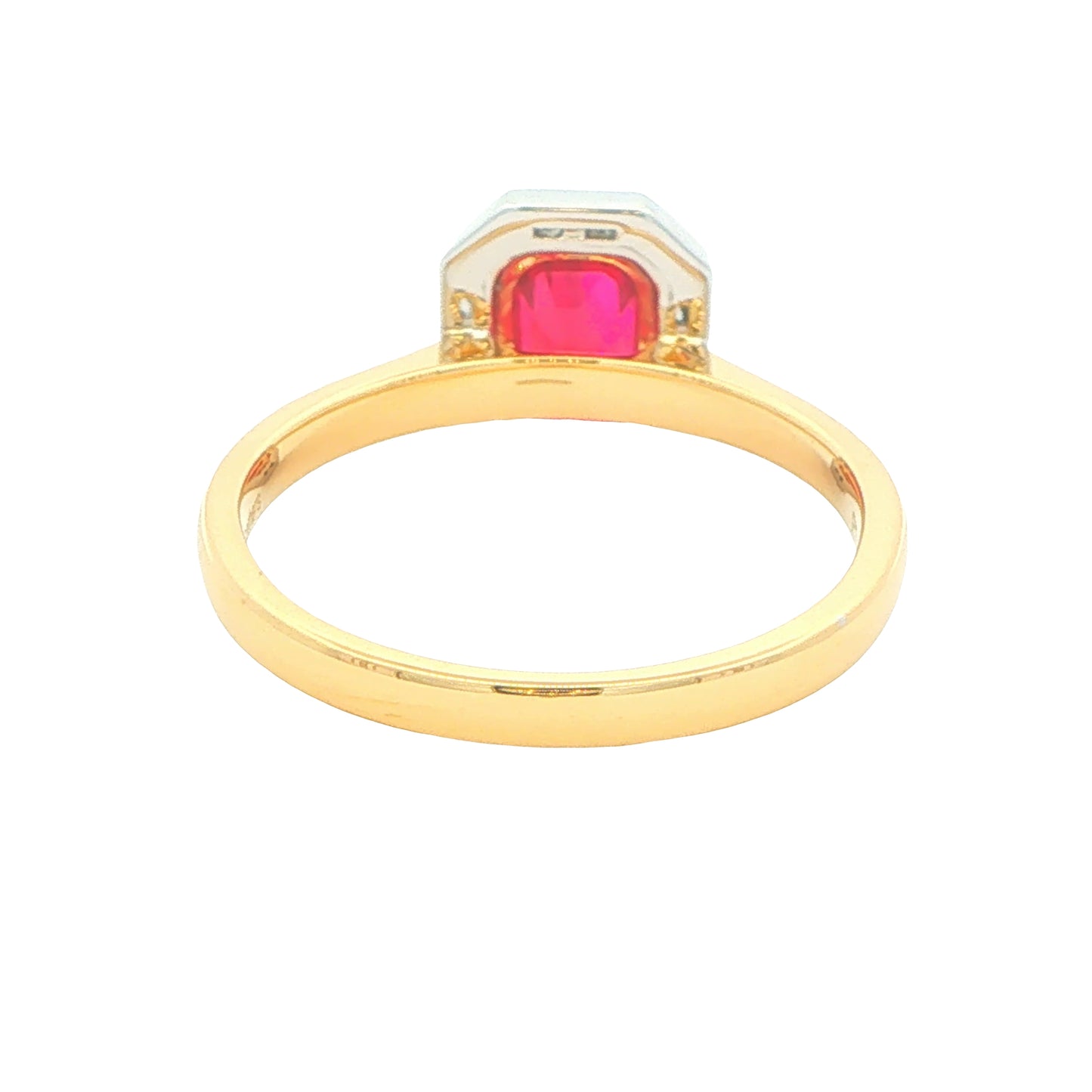 Octagonal Ruby with brilliant and baguette cut diamond cluster ring Gardiner Brothers