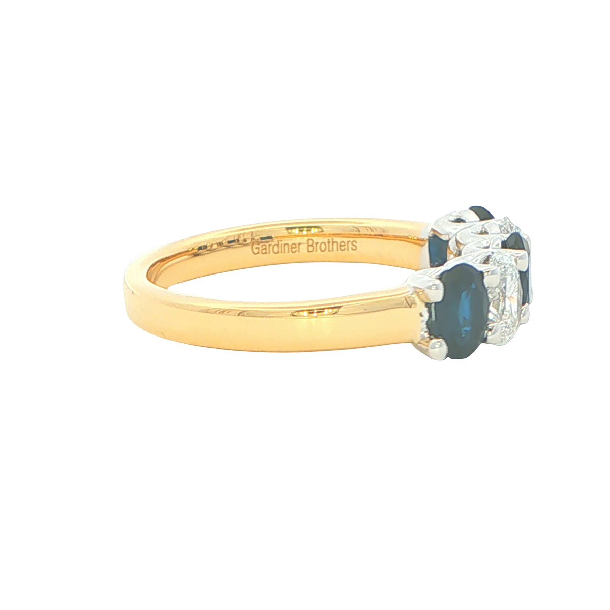 Sapphire and diamond oval shaped 5 stone ring