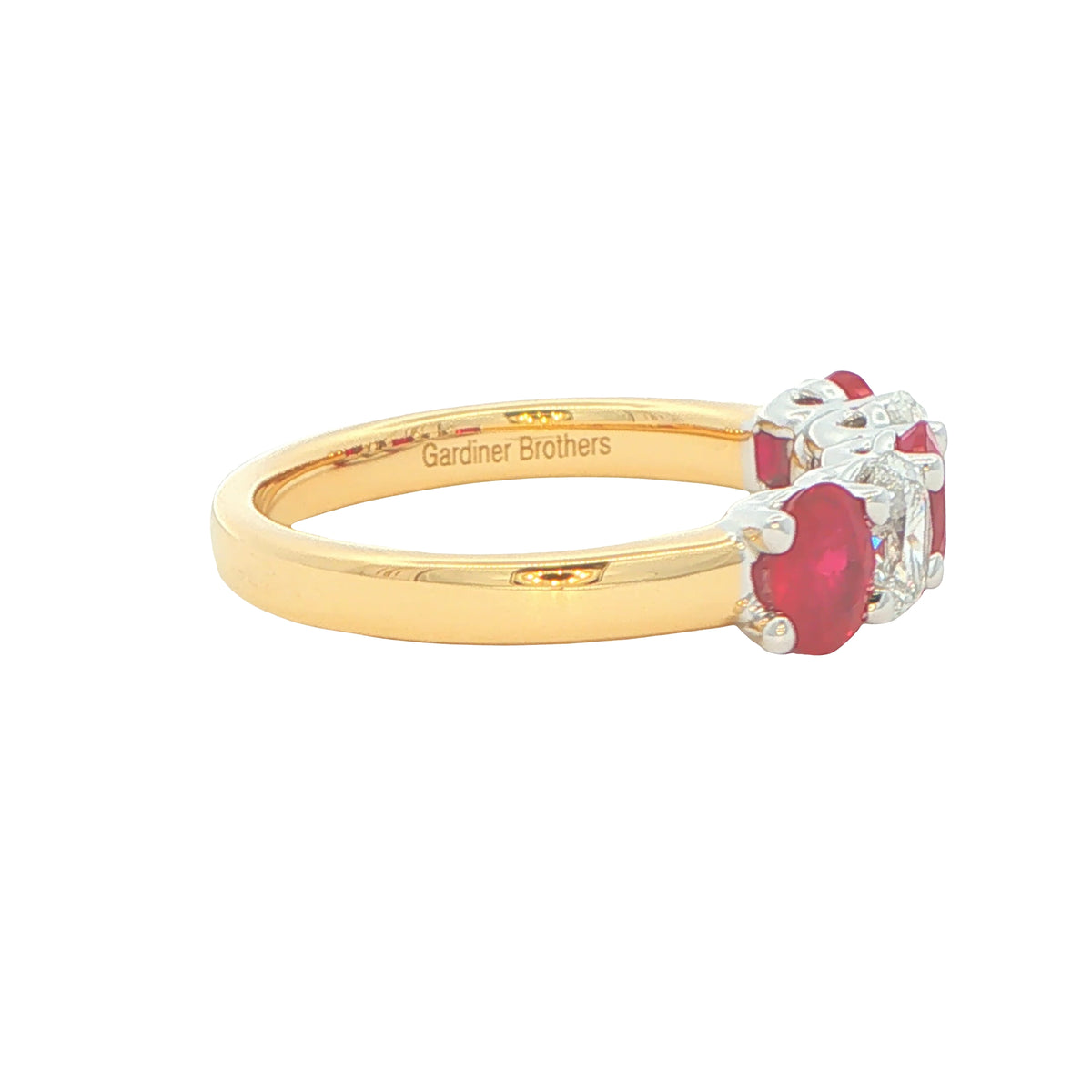 Ruby and diamond oval shaped 5 stone ring