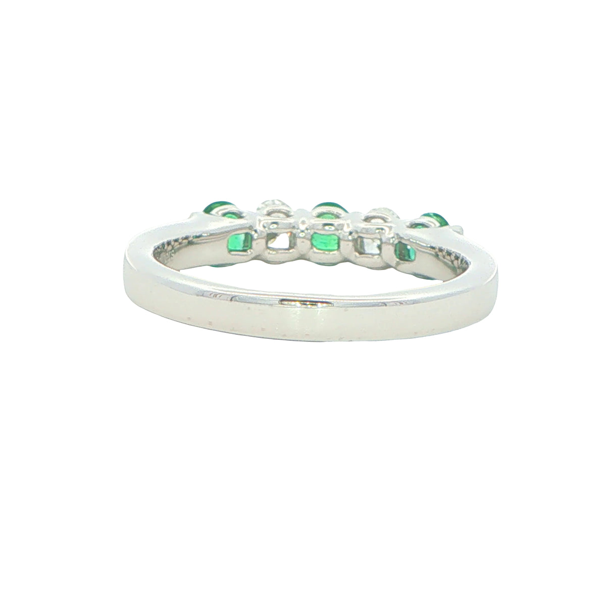 Emerald and diamond oval shaped 5 stone ring
