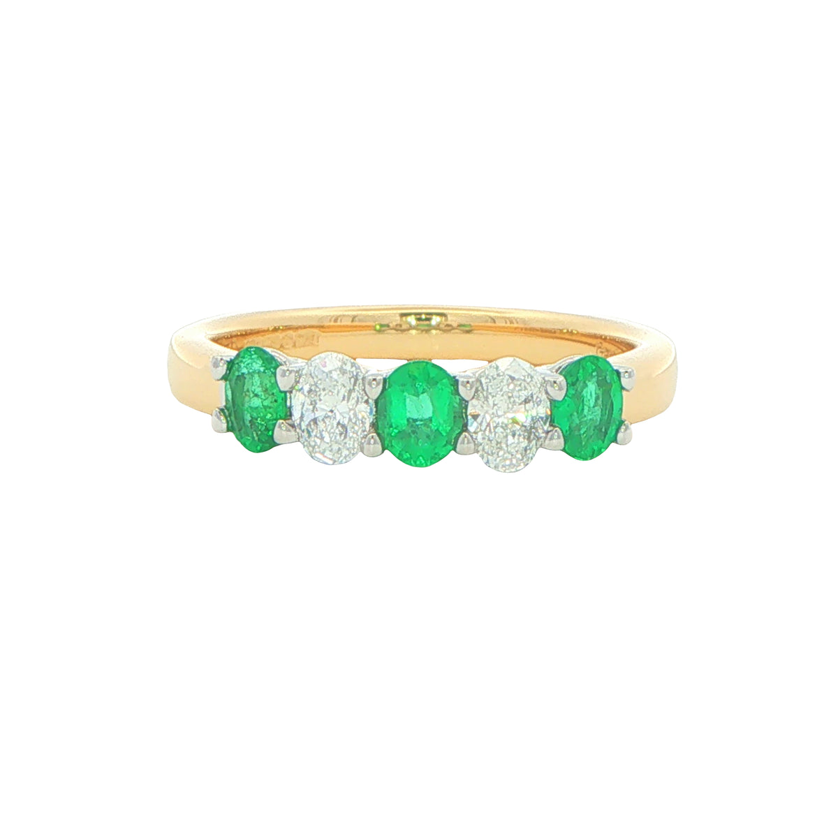 Emerald and diamond oval shaped 5 stone ring
