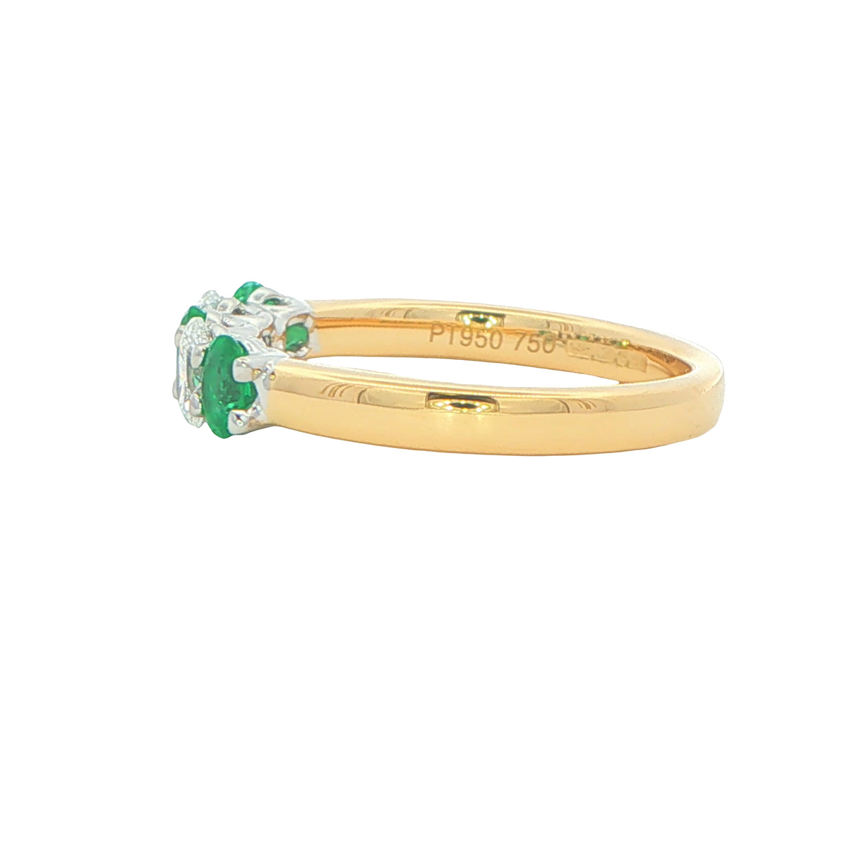 Emerald and diamond oval shaped 5 stone ring