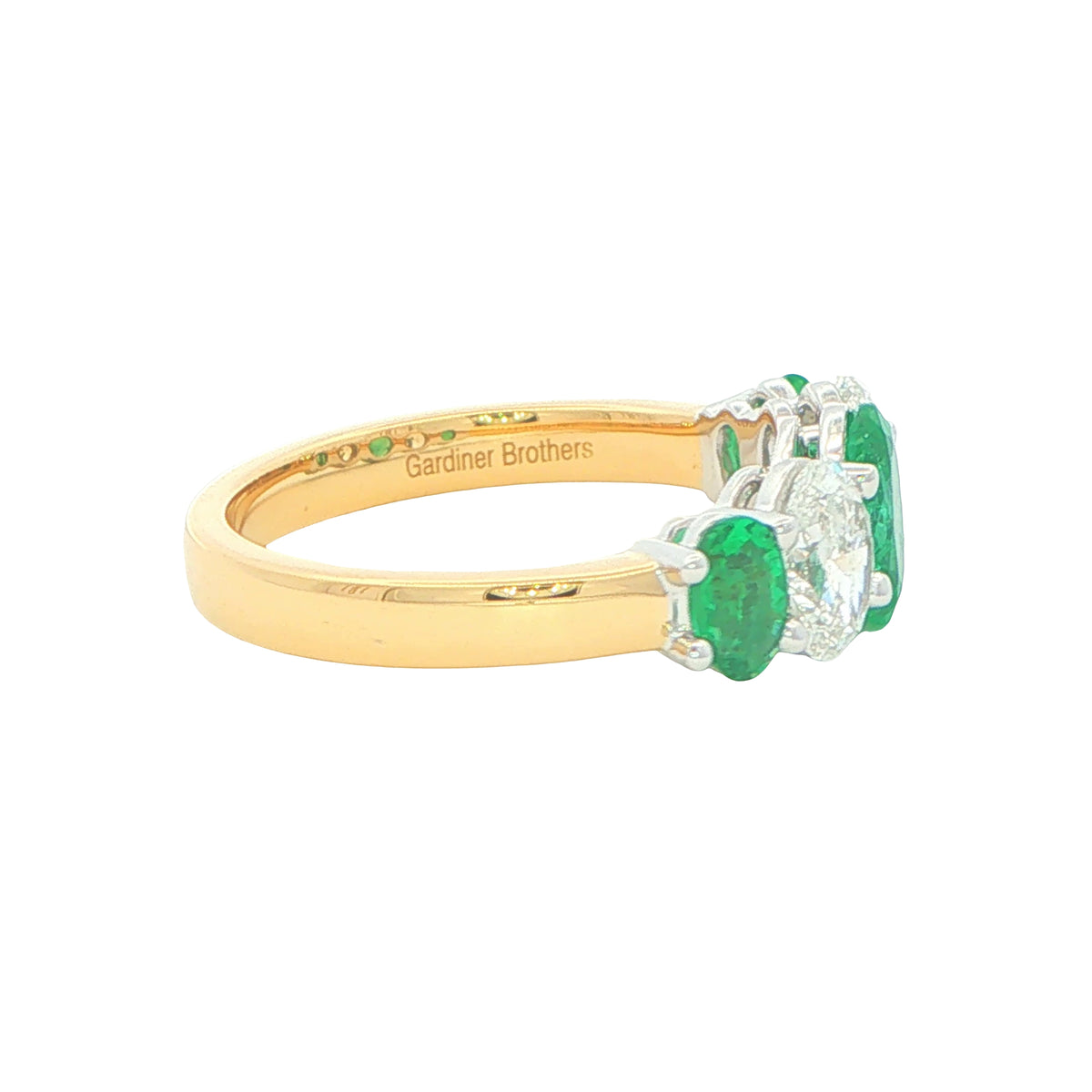Emerald and diamond oval shaped Graduated 5 stone ring