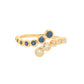 Sapphire and round brilliant cut diamond cross-over ring