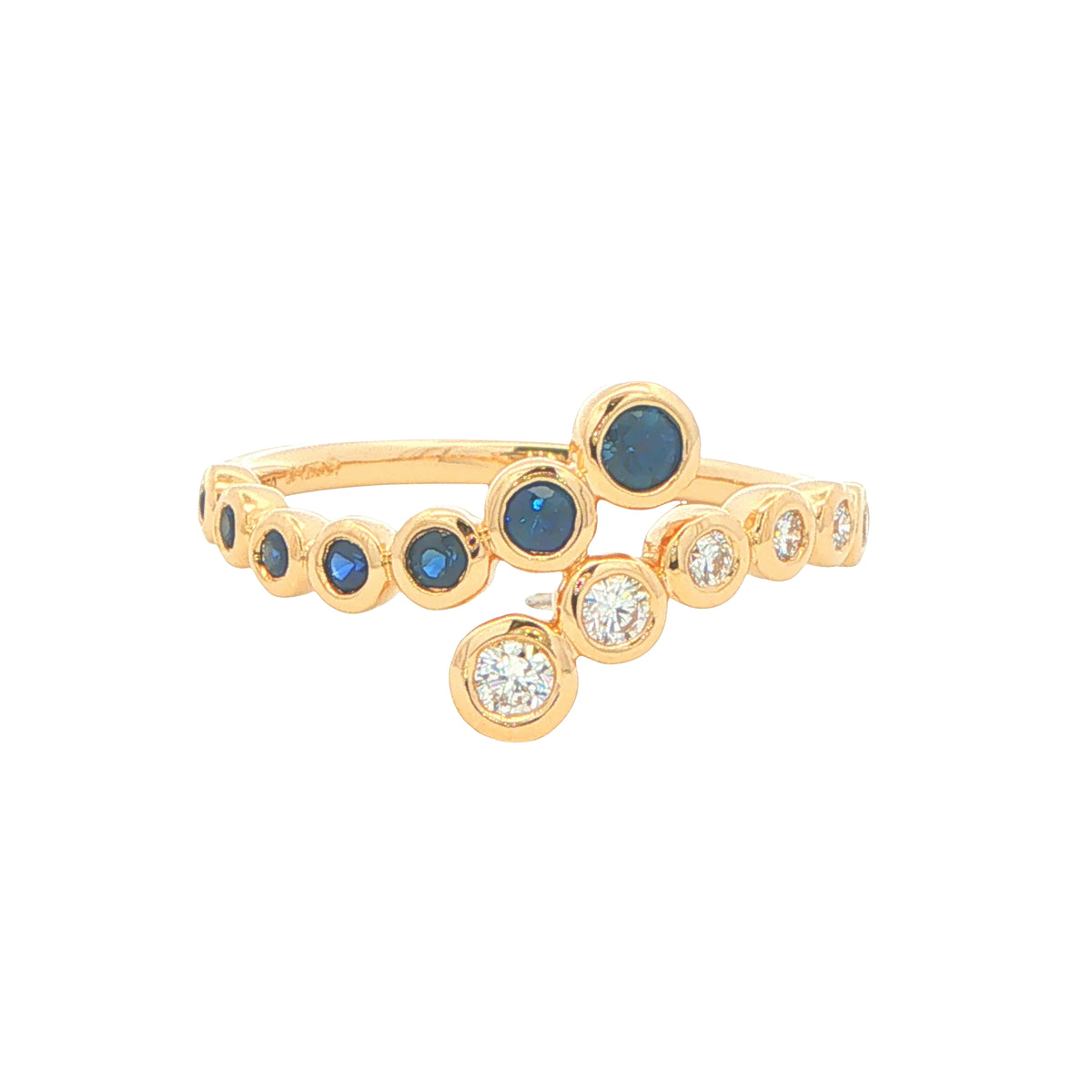 Sapphire and round brilliant cut diamond cross-over ring
