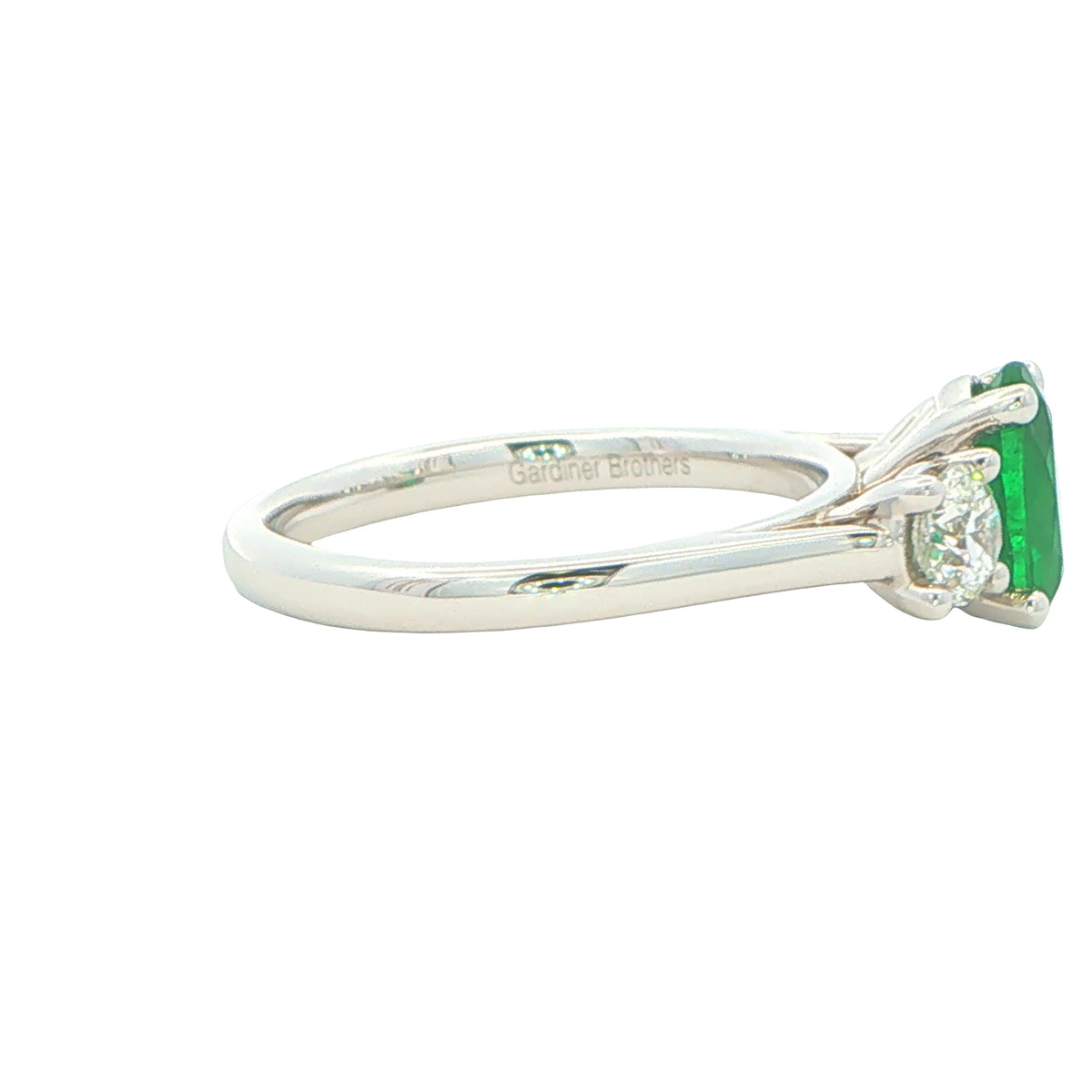 Emerald and Round Brilliant Cut Diamond 3 Stone Ring