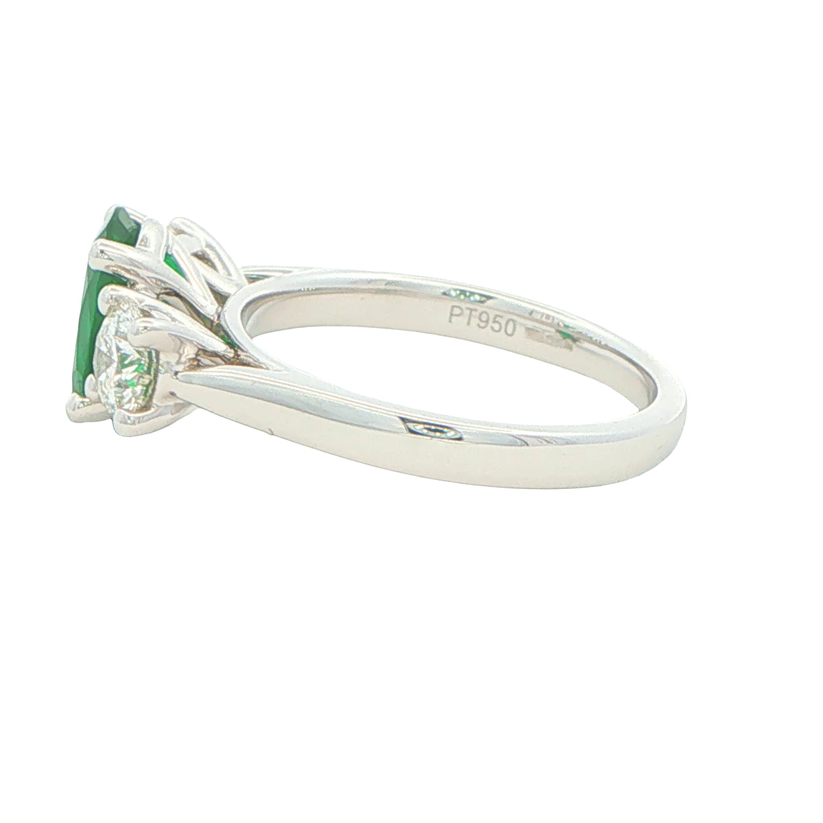 Oval Emerald and round brilliant cut diamond 3 stone ring