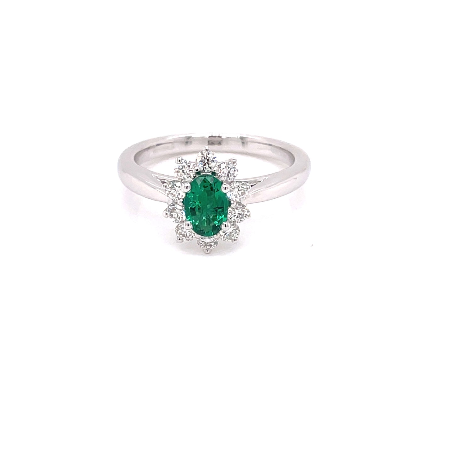 Oval Emerald and Round Brilliant Cut Diamond Cluster Style Ring  Gardiner Brothers   