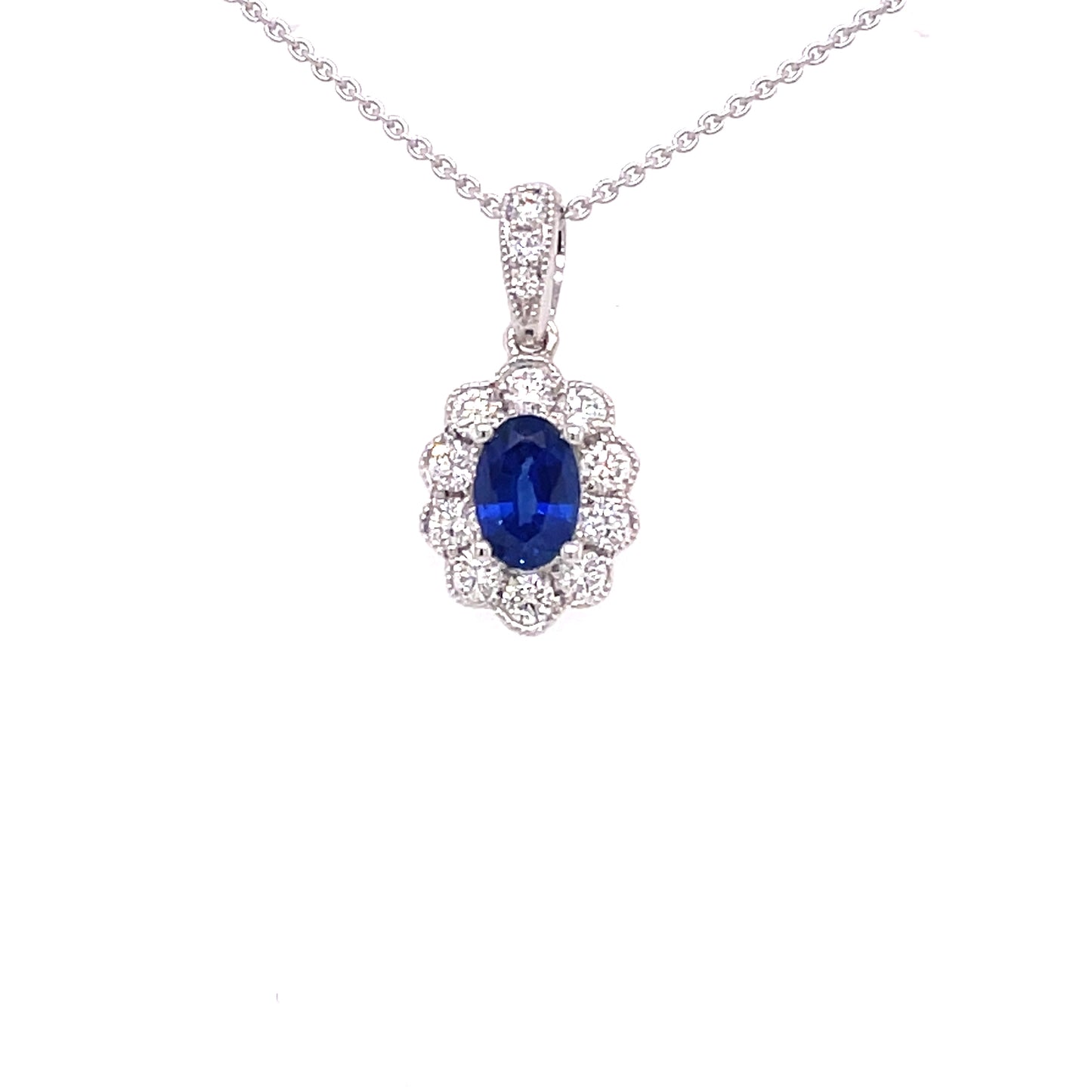 Sapphire and Round Brilliant Cut Diamond, Vintage Style Cluster Pendant  Gardiner Brothers   