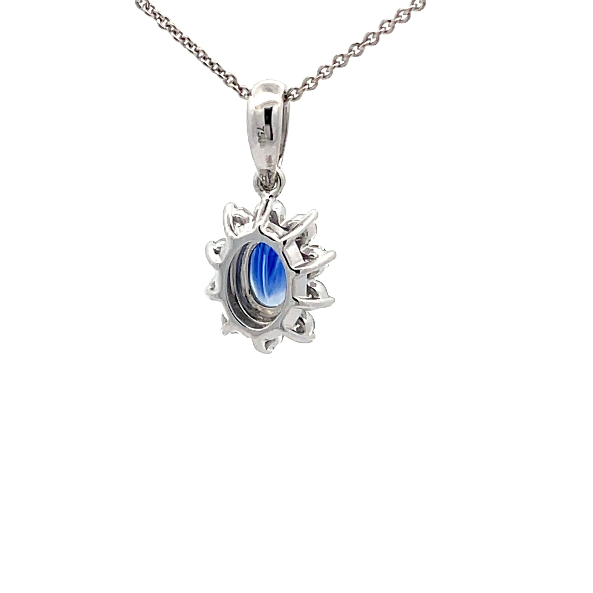 Sapphire and round brilliant cut diamond cluster style pendant  Gardiner Brothers   