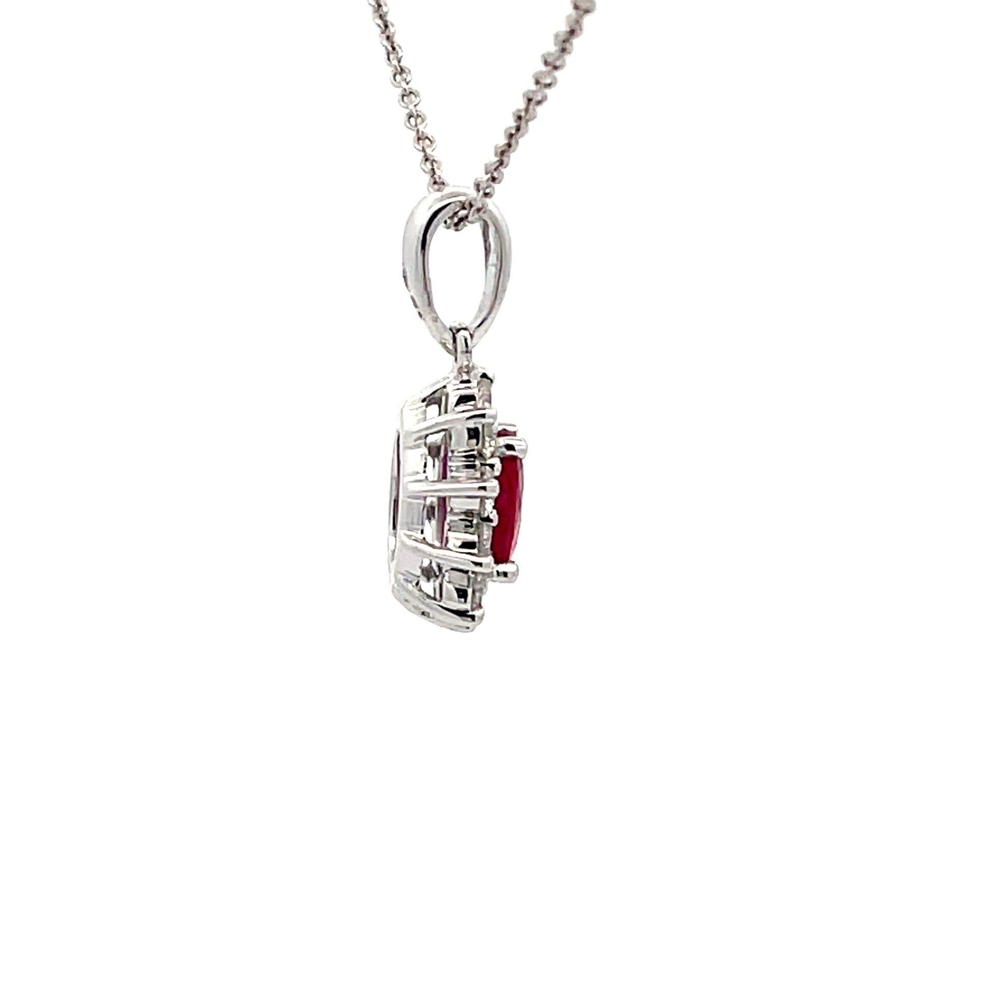 Ruby and diamond cluster style pendant  Gardiner Brothers   