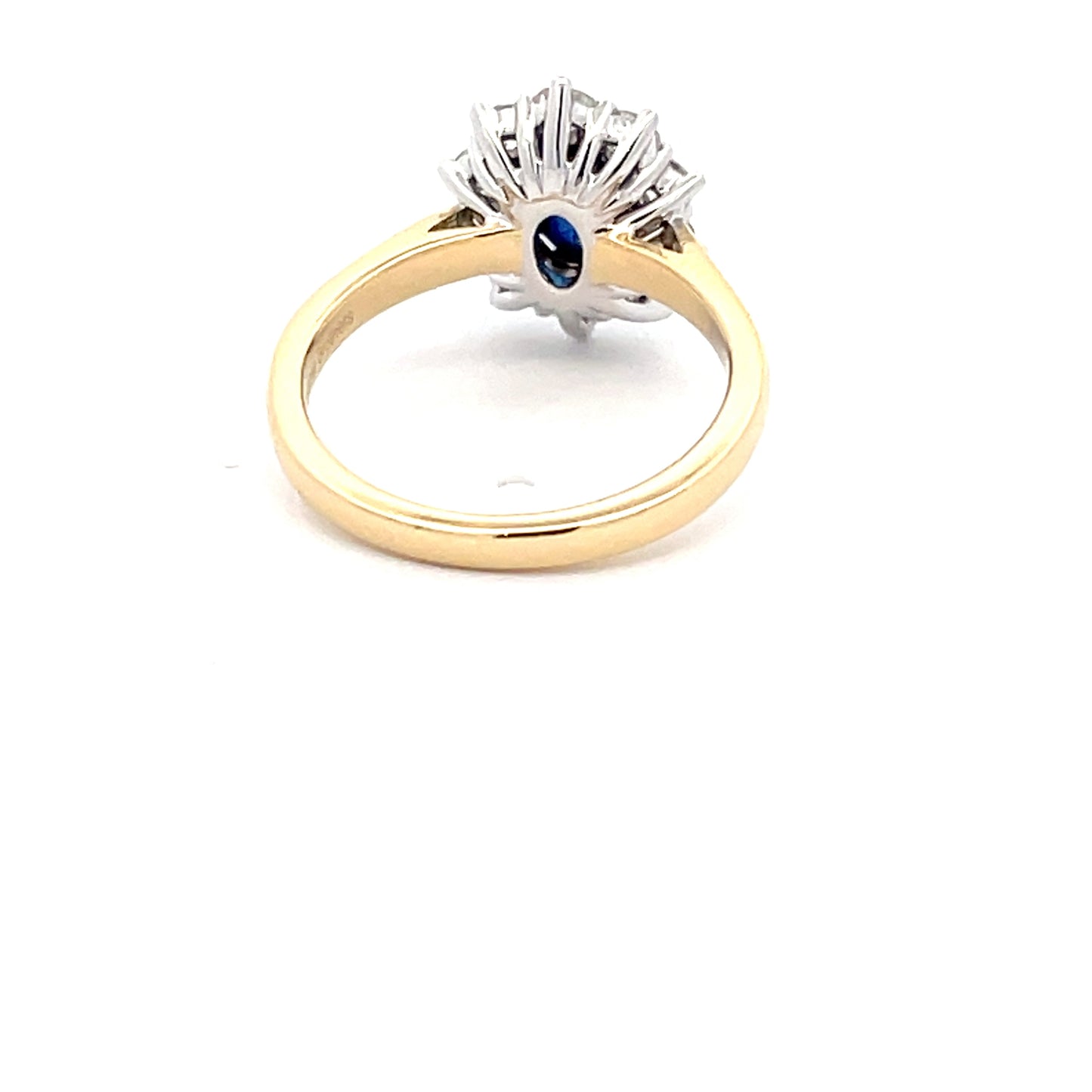 SAPPHIRE AND ROUND BRILLIANT CUT DIAMOND CLUSTER STYLE RING  Gardiner Brothers   