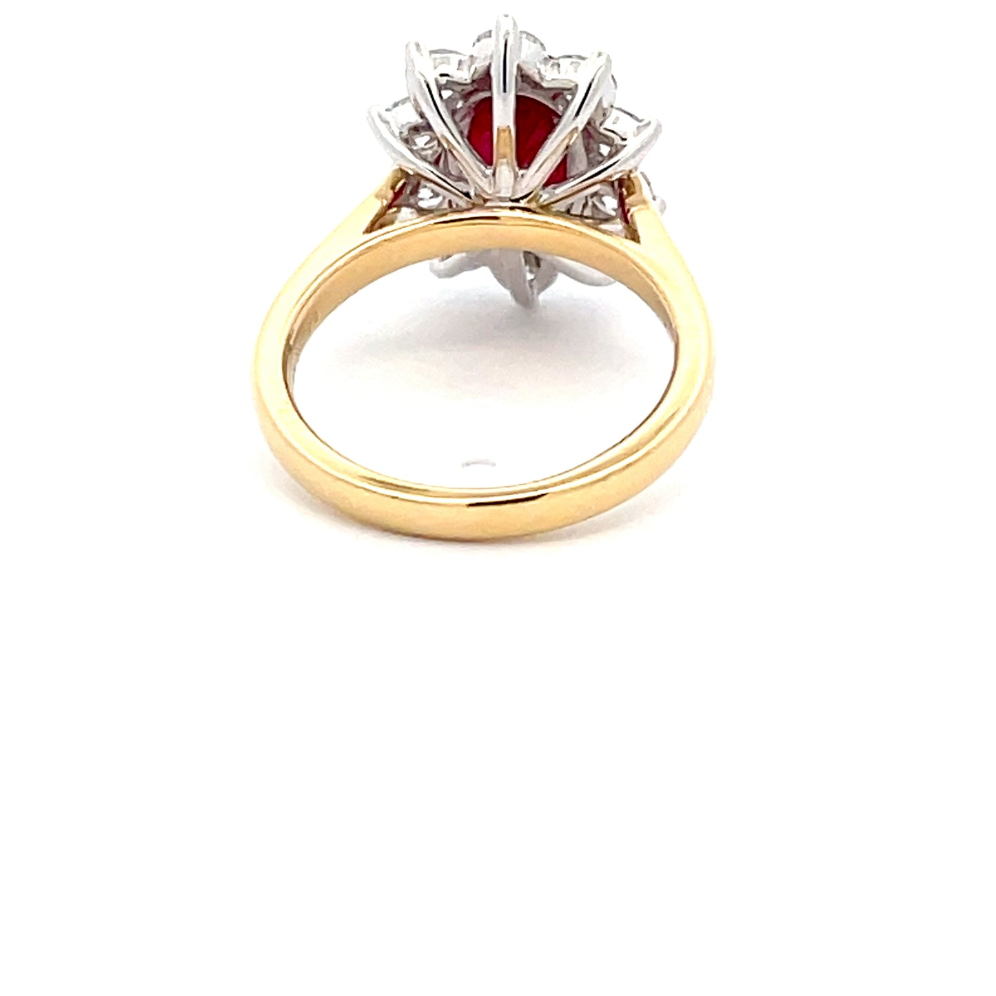 Oval Shaped Ruby and round brilliant Cut Diamond Cluster Ring  Gardiner Brothers   